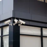 CCTV security cameras installed on a modern commercial building in Dubai